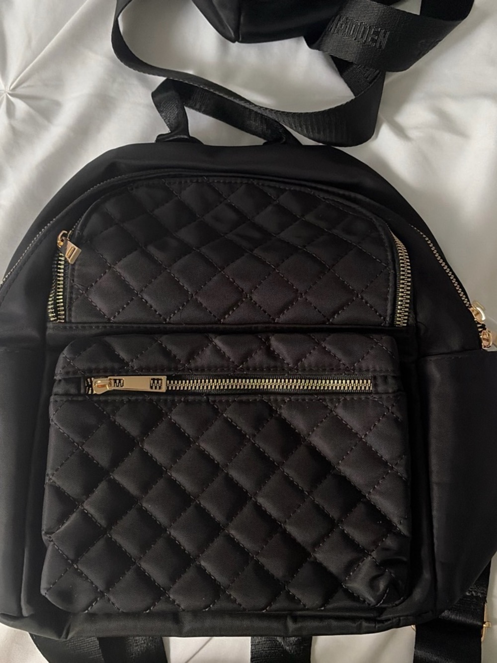 Backpack black with gold detailing
